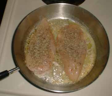 Chicken browning in skillet